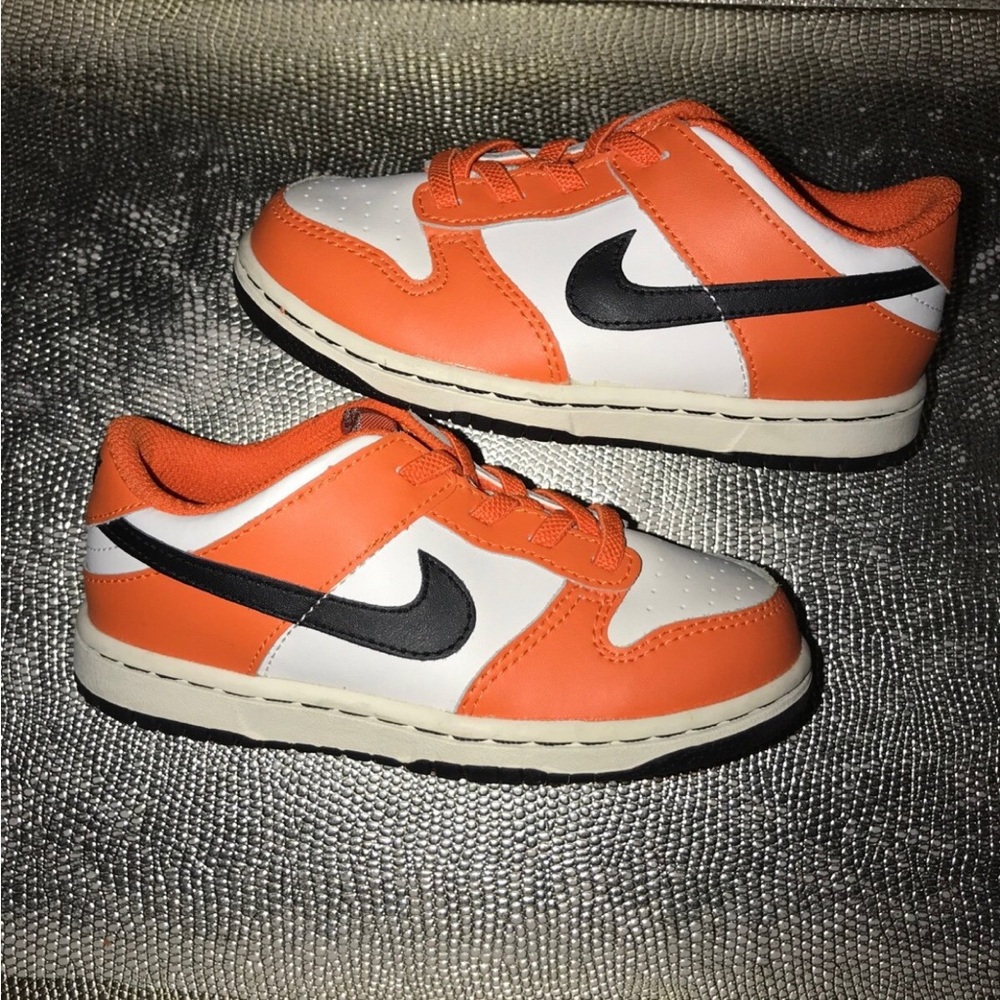 Nike low dunks Kids Black, Orange, and White Sneakers size 10- worn once